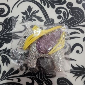 Sparkling Stone Pony Bag Charm with Yellow Tassels